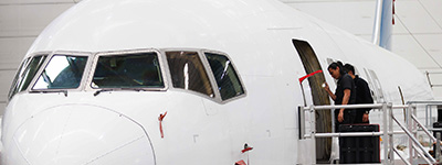 Atlantic Aviation Group team members in hanger